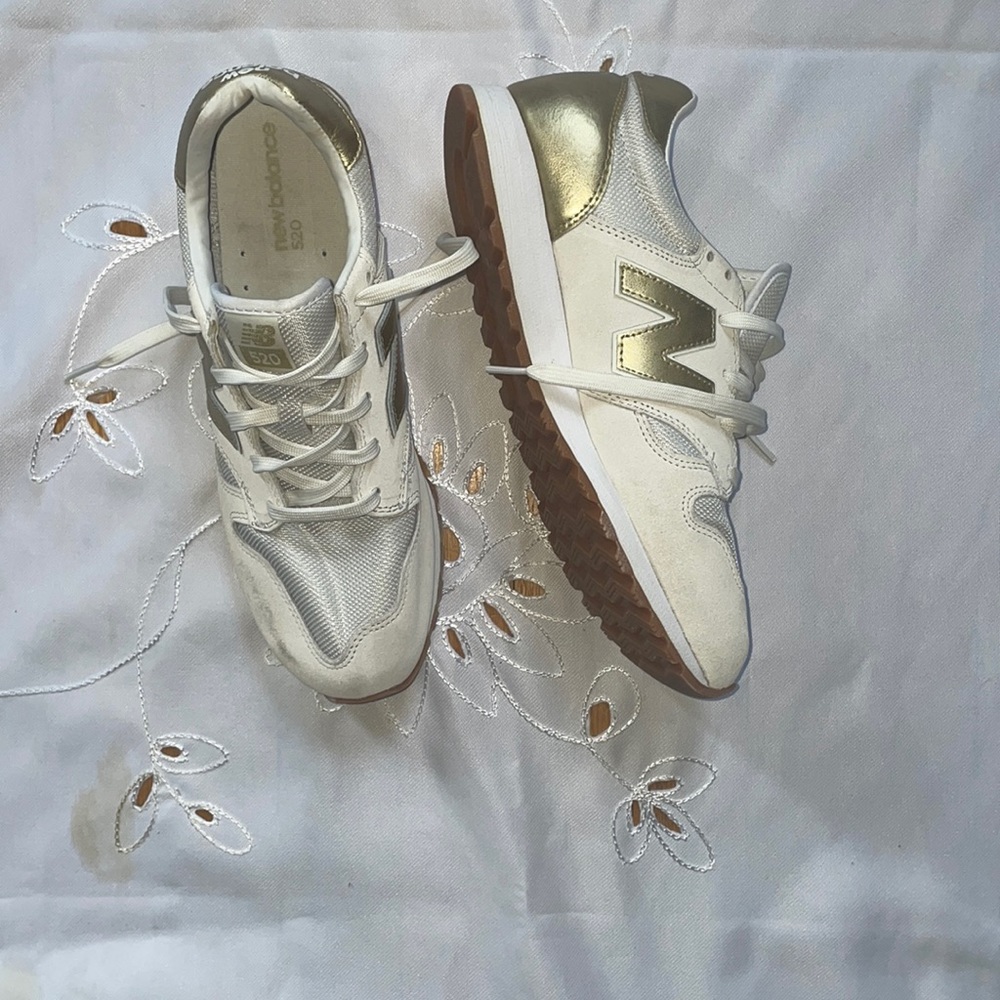 New Balance white w/gold logo, size 11 women’s